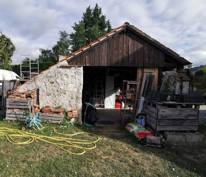 Maitre d'Œuvre Constans - reconstruction d'un garage et rénovation d'une couverture d'une habitation à Olivet